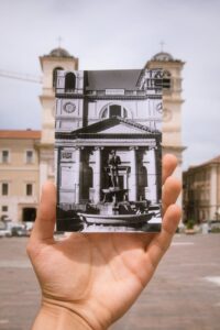 hand holding black and white historic photo